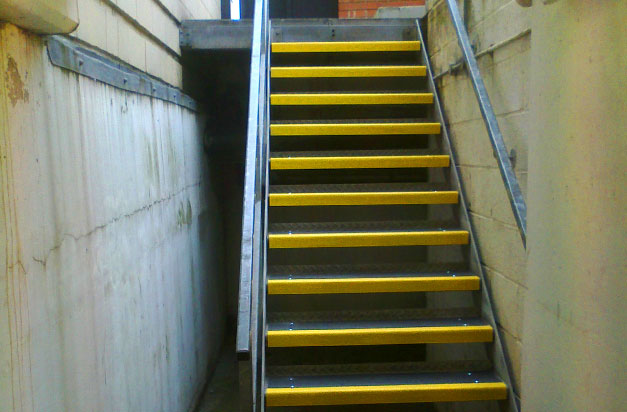 Industrial steel staircase with anti-slip stair treads. Industrial steel staircase with anti-slip stair treads.